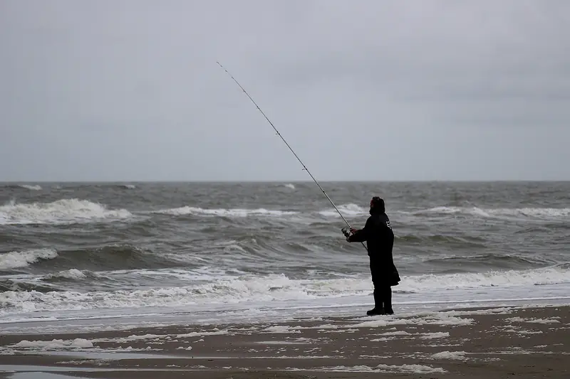 Angler am Strand von Petten